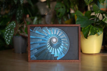 Load image into Gallery viewer, Mini Museum Volume II pictured with the postcard Engrenages in landscape format