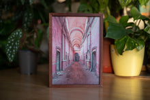 Load image into Gallery viewer, Mini Museum Volume II pictured with the postcard Baie Rosa standing up in portrait mode